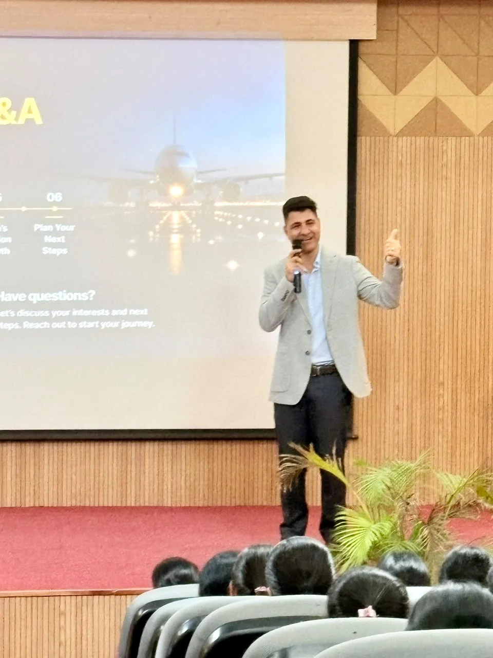 Cdr Naveen Pandita delivering aviation careers keynote at MVM College Bengaluru
